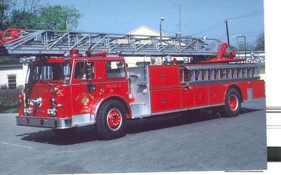 Truck 3   1972  100' Seagrave Rear Mount
